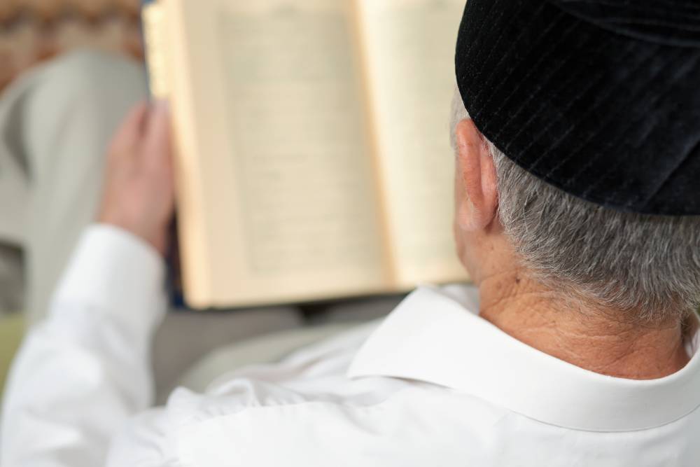 Rabbi Image An old man reading a book. Selective focus